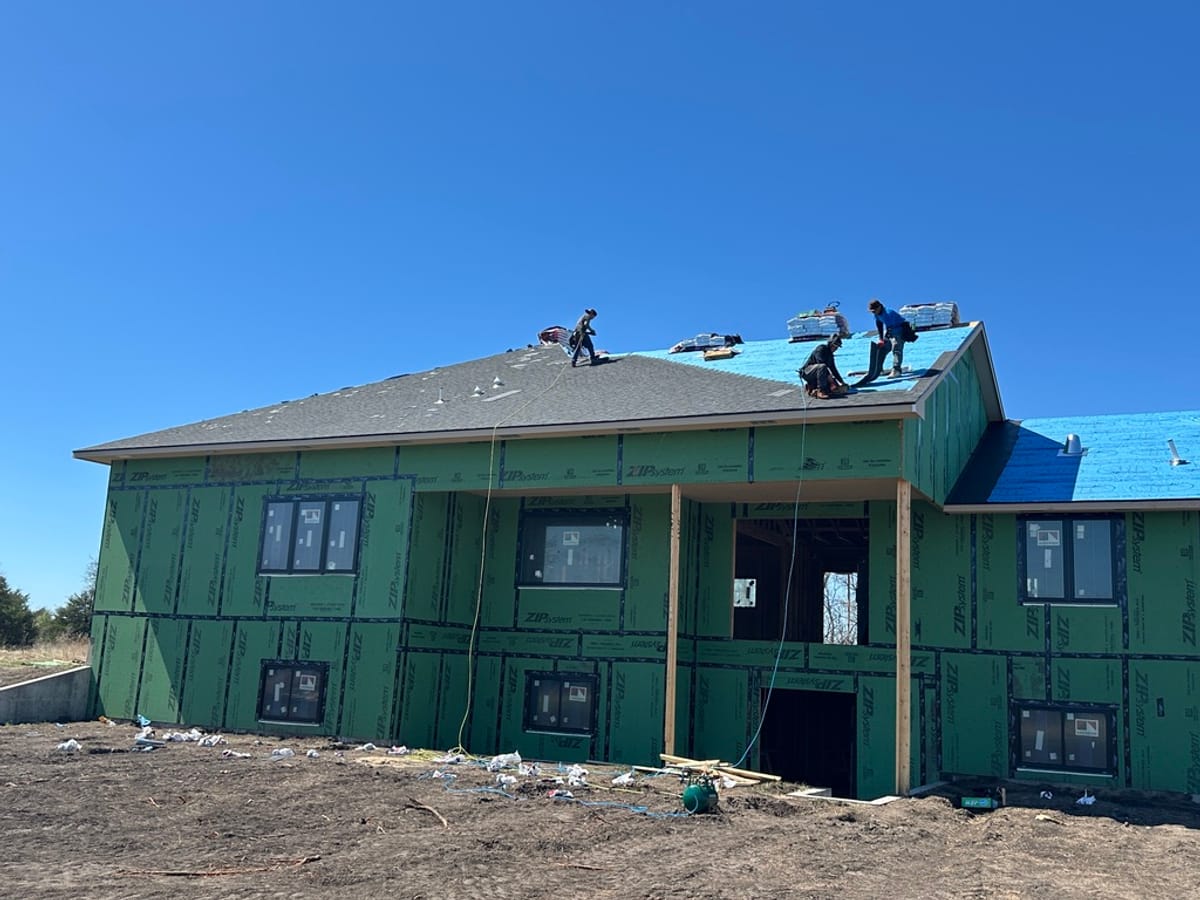 A residential roof replaced by JAKS Construction in the Wichita area