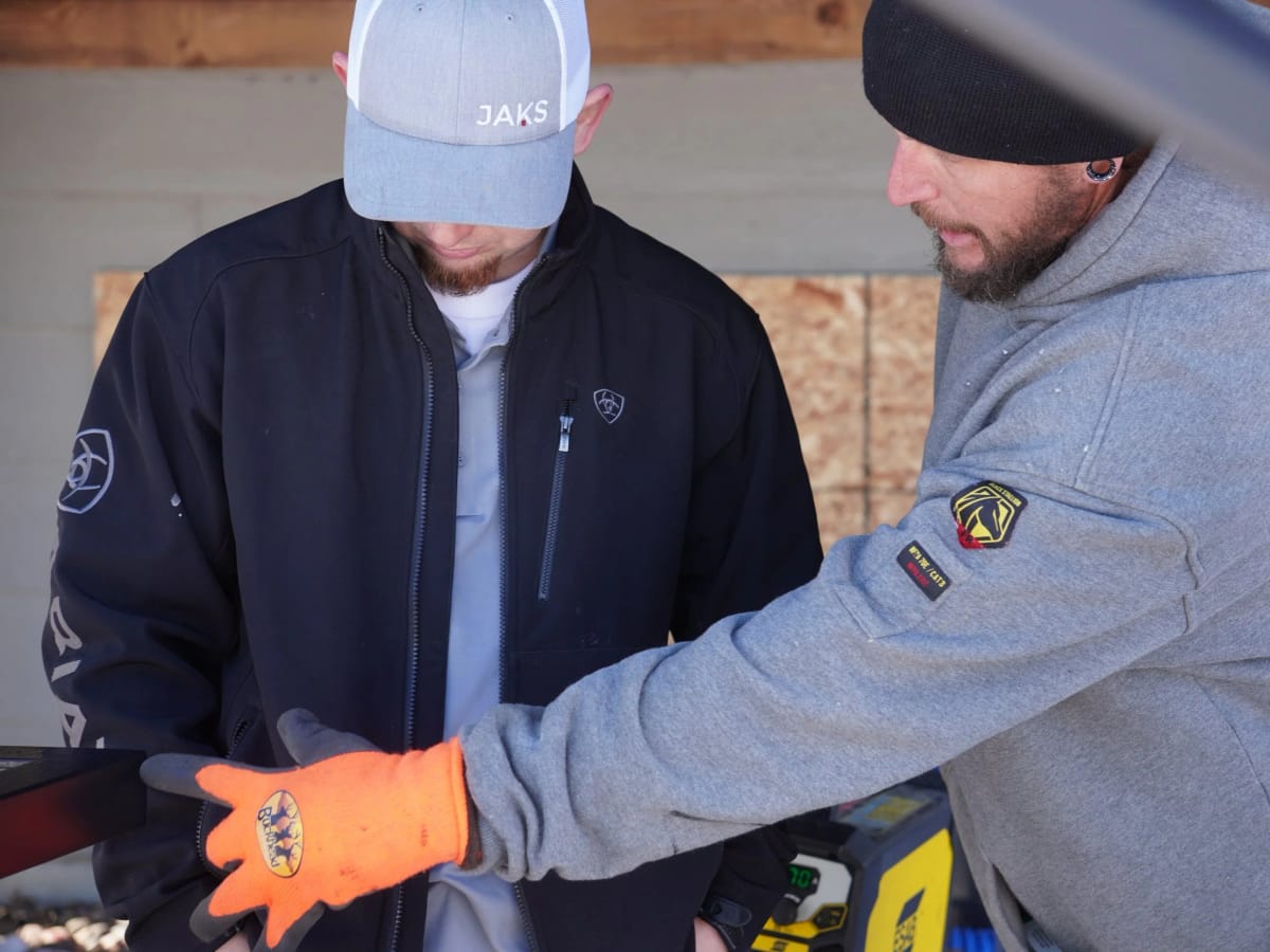 JAKS Construction team members working together on a job site